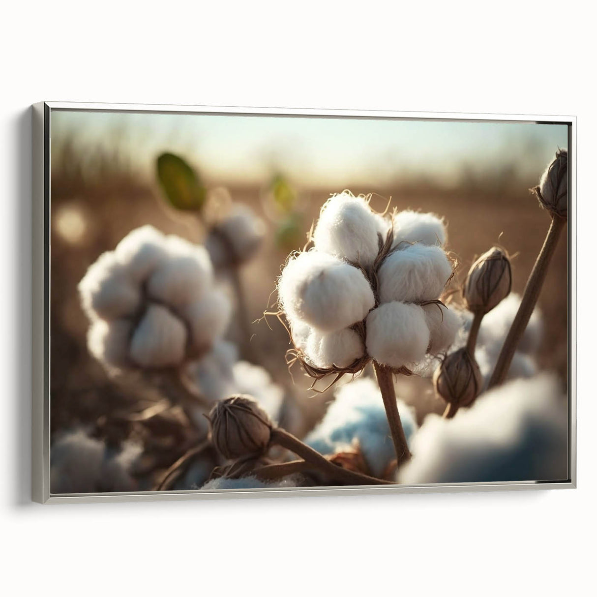 Framed botanical wall art featuring vibrant flowers on a textured cotton canvas with a sleek silver frame, showcasing elegance and nature-inspired decor for modern interiors.