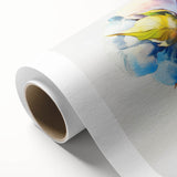 Botanical wall art collection showcasing vibrant floral patterns on cotton canvas, elegantly rolled for display, perfect for home decor enthusiasts.