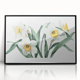 Framed wall art featuring a botanical daffodil design with vibrant yellow flowers against a sleek black background, ideal for home decor or floral-themed interiors.