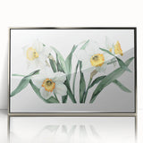 Framed acrylic wall art showcasing a vibrant botanical daffodil design with silver accents, perfect for home decor, adding a touch of elegance and nature.