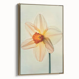 Framed canvas wall art showcasing a botanical daffodil design in vibrant colors, elegantly displayed with a gold frame, perfect for home decor enhancement.