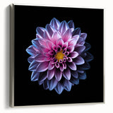 Framed wall art showcasing a detailed botanical dahlia design on canvas, featuring a silver frame, perfect for enhancing home decor with a floral aesthetic.