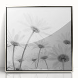 Framed wall art featuring a botanical daisy design on a silver acrylic background, showcasing vibrant floral details and a modern aesthetic, perfect for home decor.