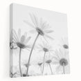 Stretched canvas wall art showcasing a vibrant botanical design of daisies in soft pastel colors, perfect for home decor. Side view highlights the canvas texture and framing quality.