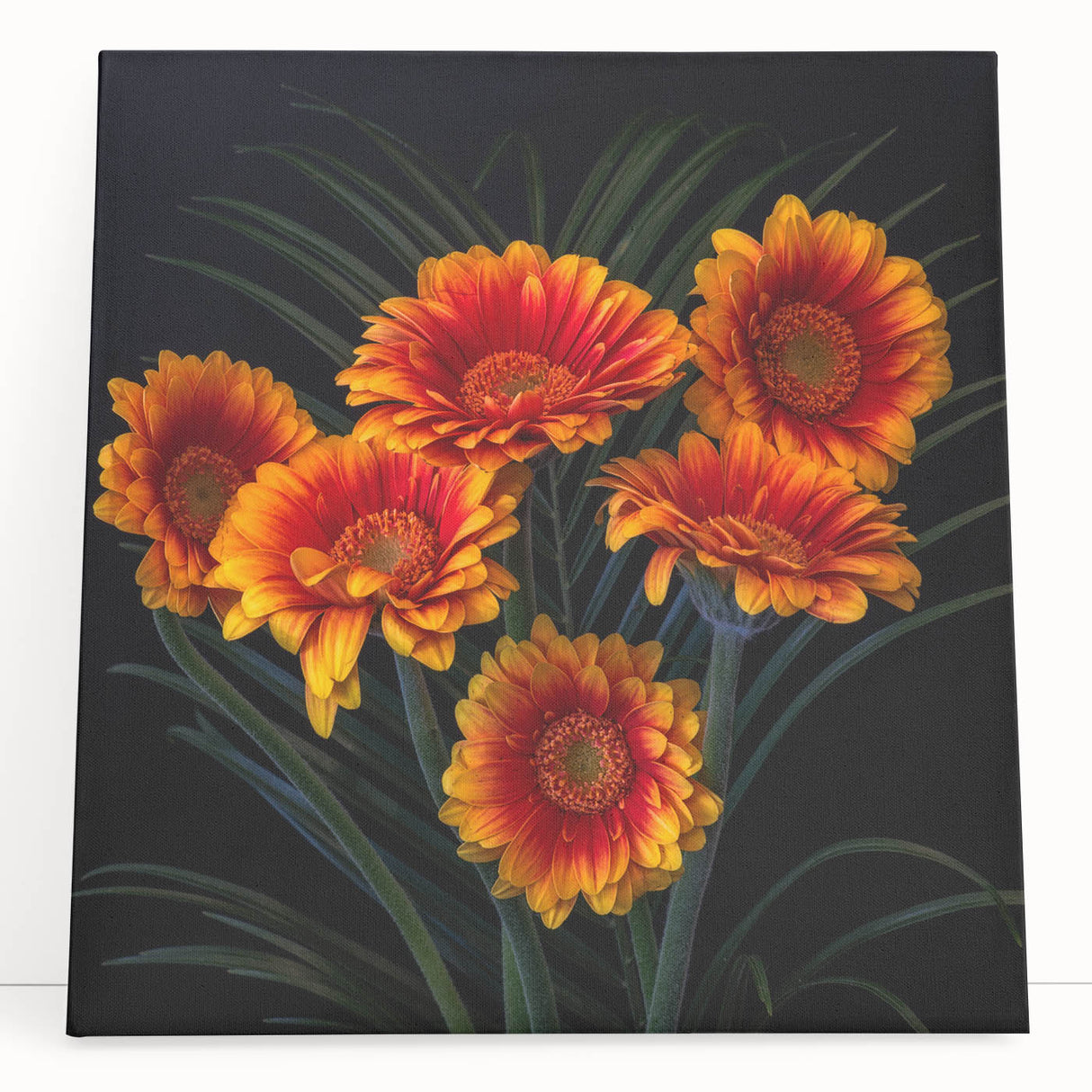 Stretched canvas wall art featuring a botanical daisy design in vibrant colors, leaning against a neutral backdrop, ideal for home decor or floral-themed interiors.