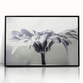 Framed wall art showcasing a botanical daisy design in vibrant colors, featuring a sleek black frame. Ideal for enhancing home decor with a touch of nature.