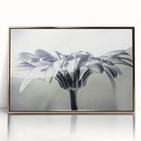 Framed botanical wall art featuring a vibrant daisy design with a gold-acrylic finish, perfect for adding a touch of nature-inspired elegance to any interior decor.