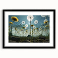 Framed botanical wall art featuring dandelion design in black frame with mat, showcasing delicate floral details perfect for home decor.