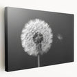 Stretched canvas wall art showcasing a detailed botanical design of a dandelion, featuring vibrant colors and a textured finish, ideal for home decor.