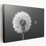 Stretched canvas wall art showcasing a detailed botanical design of a dandelion, featuring vibrant colors and a textured finish, ideal for home decor.