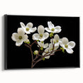 Framed wall art featuring a botanical dogwood design on canvas, showcasing vibrant flowers and intricate details against a sleek black frame, ideal for home decor.