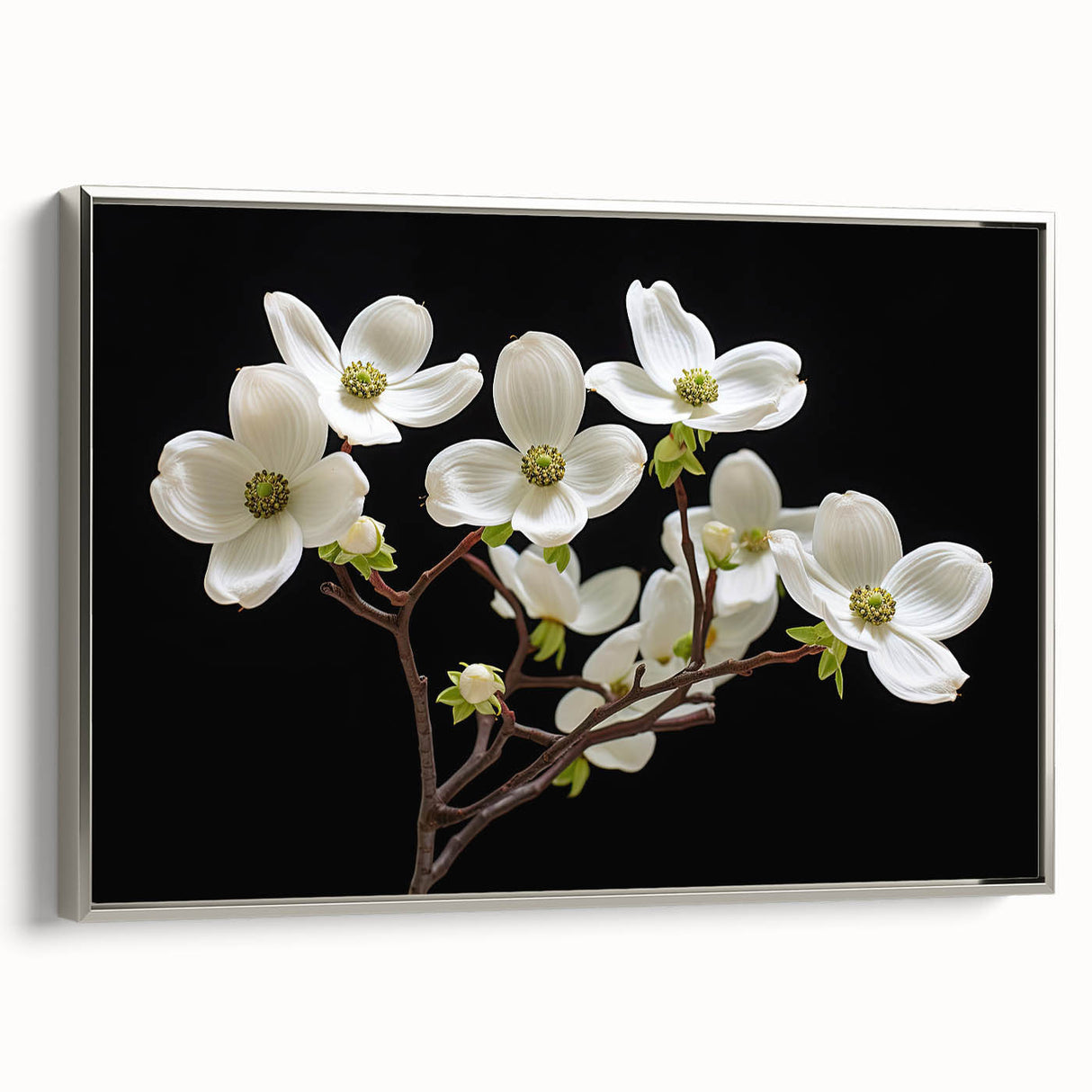 Framed botanical wall art featuring a delicate dogwood design, elegantly displayed with a silver frame, showcasing intricate floral details and a modern aesthetic.