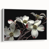 Framed wall art featuring a botanical dogwood design on canvas, showcasing vibrant floral colors and intricate details, set against a white background for a modern decor accent.