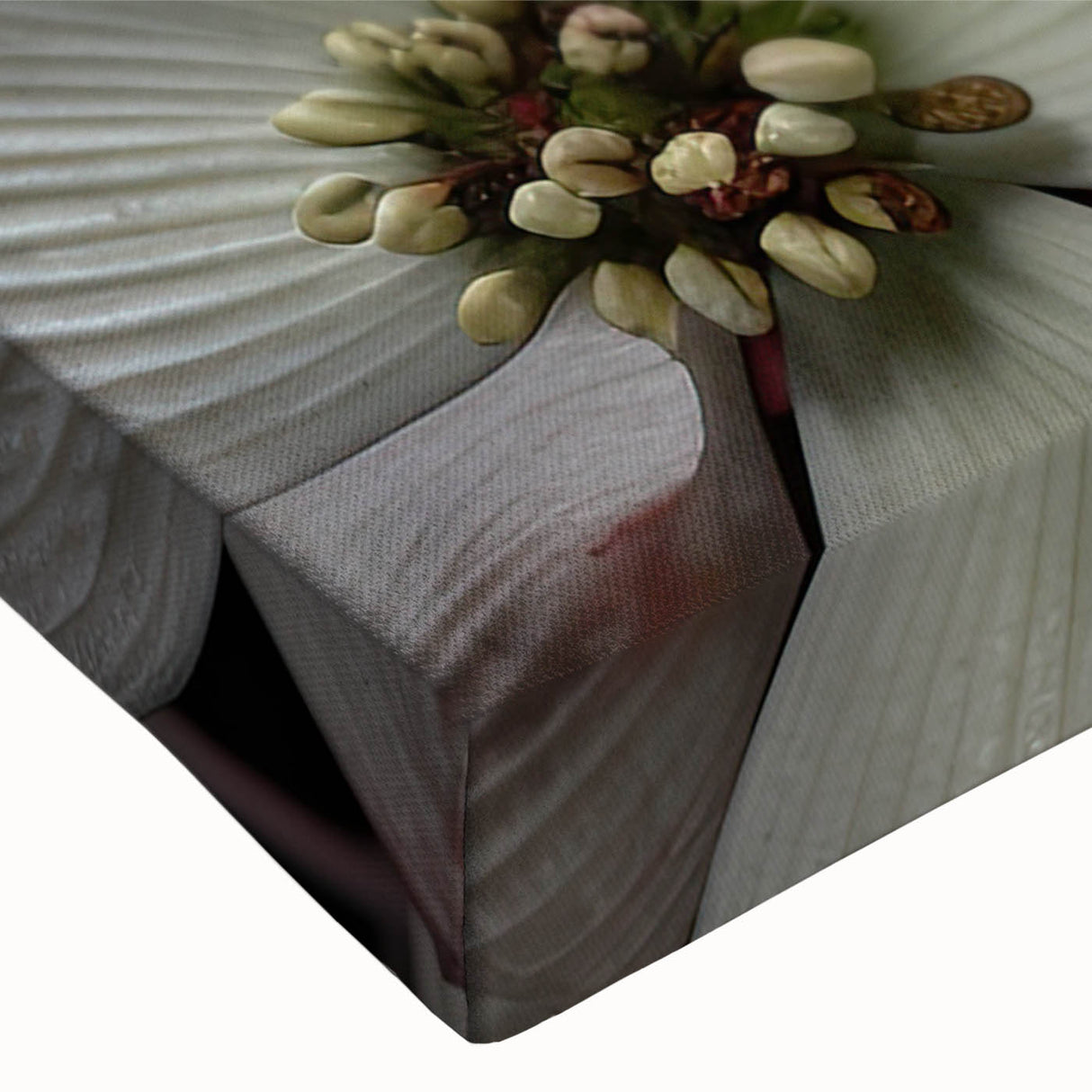 Close-up of a botanical dogwood design on stretched canvas wall art, showcasing delicate pink flowers and lush green leaves against a neutral background. Perfect for home decor.