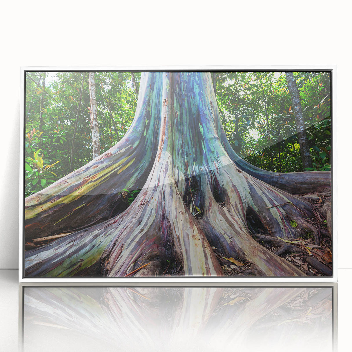 Framed wall art showcasing a botanical eucalyptus design in soft green tones, elegantly displayed in a white frame, perfect for home decor enhancement.