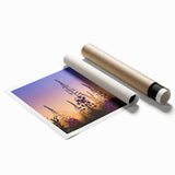 Vibrant botanical wall art print showcasing fireweed flowers in shades of pink and green, rolled for easy display and shipping in a protective tube.