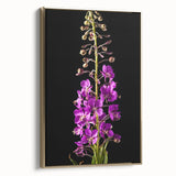 Framed botanical wall art featuring vibrant fireweed design in gold frame, showcasing a side view of the canvas. Ideal for nature-inspired home decor.