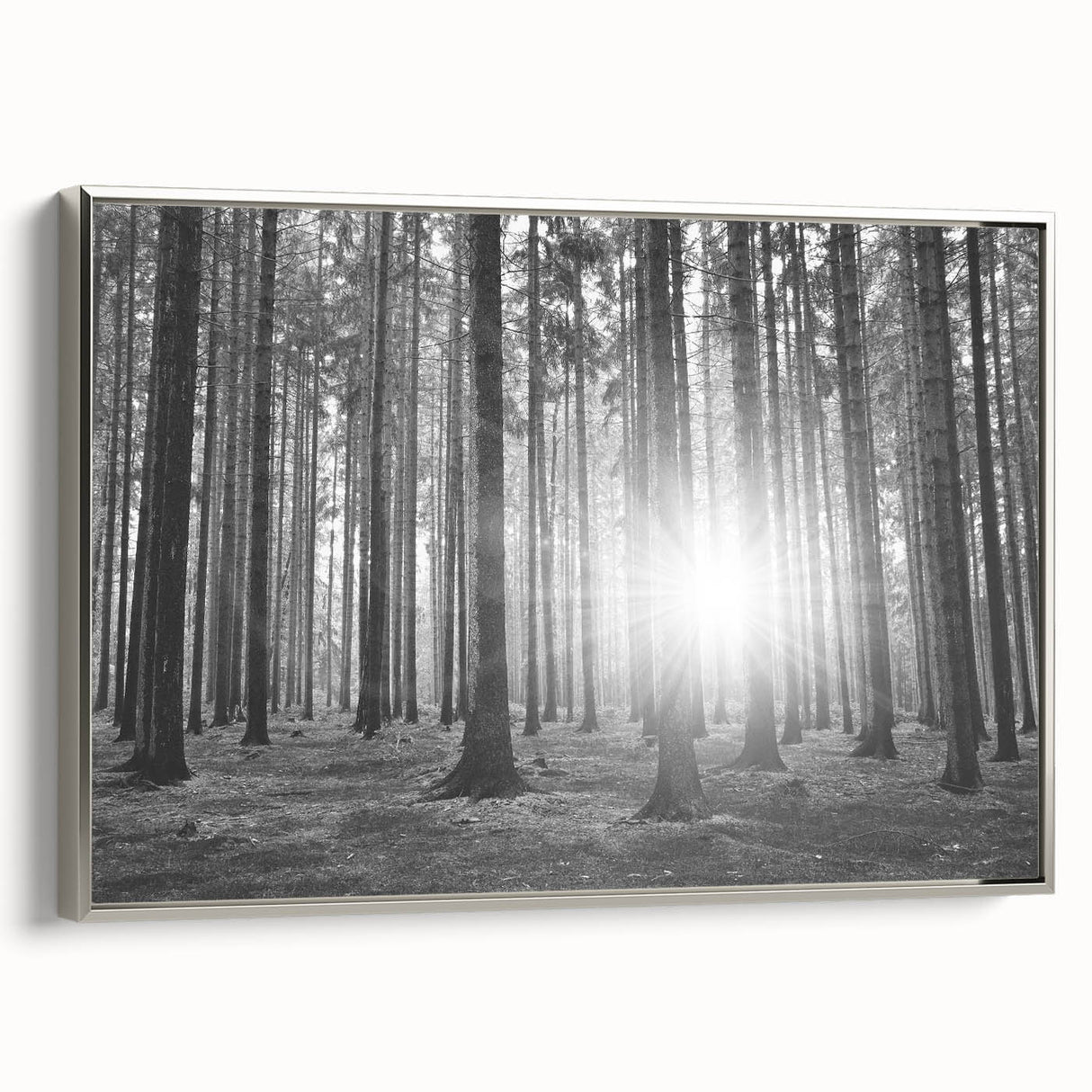 Framed silver wall art showcasing a botanical forest design with vibrant flowers and trees, adding a touch of nature-inspired elegance to any space.