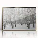 Framed wall art featuring a botanical forest design with vibrant flowers and trees, accented by a sleek gold frame, perfect for enhancing home decor.