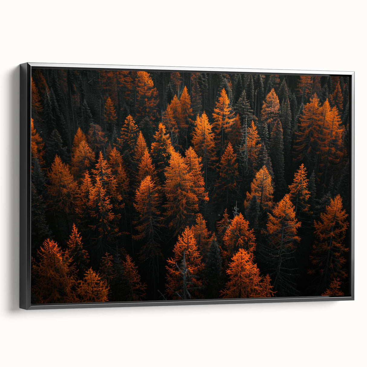 Framed wall art featuring a botanical forest design with vibrant flowers and trees, showcasing a black frame and a side view that highlights its depth and texture. Perfect for nature-themed decor.