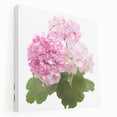 Stretched canvas wall art showcasing a vibrant botanical geranium design, featuring rich green leaves and pink flowers, ideal for home decor.