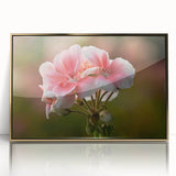Framed wall art featuring a botanical geranium design with vibrant colors, elegantly displayed in a gold frame to enhance any interior decor. Perfect for nature-inspired aesthetics.