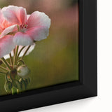 Close-up of a framed botanical wall art piece showcasing vibrant pink geranium flowers with detailed textures, perfect for enhancing home decor and adding a touch of nature.