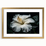 Elegant wall art featuring a botanical hibiscus design in vibrant colors, framed in gold with a matte finish, ideal for enhancing home decor aesthetics.