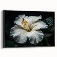 Framed canvas wall art showcasing a vibrant hibiscus botanical design in a sleek black frame, highlighting intricate floral details and rich colors, ideal for home decor.