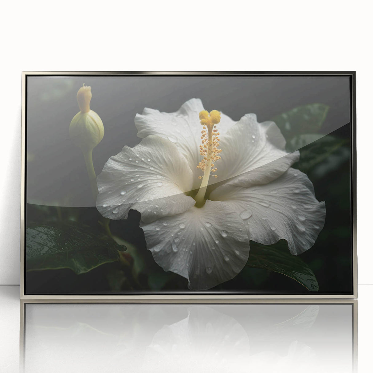 Framed botanical hibiscus wall art featuring vibrant pink and green colors set against a silver background, adding a touch of elegance to any decor.