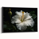 Framed canvas wall art showcasing a vibrant hibiscus botanical design with a black frame, ideal for home decor. Perfect for adding a tropical touch to living spaces.