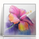 Framed wall art featuring a vibrant botanical hibiscus design on acrylic, showcasing intricate floral details in white frame, perfect for home decor enhancement.