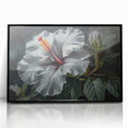 Framed wall art featuring a botanical hibiscus design in vibrant colors, showcasing intricate floral details against a sleek black frame, ideal for home decor.