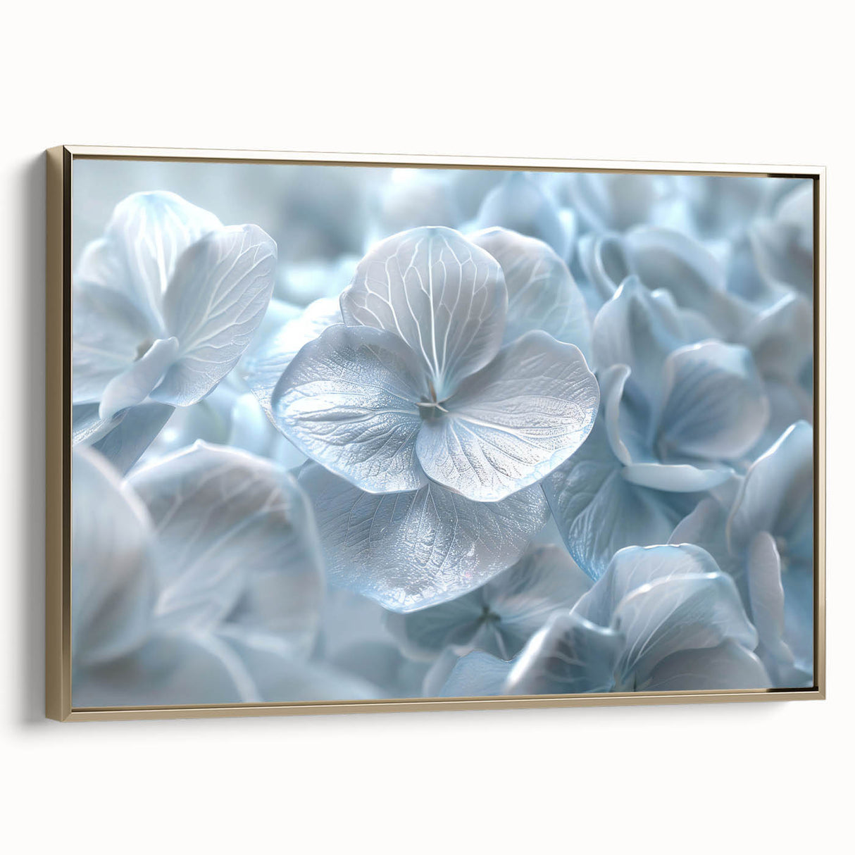 Framed canvas wall art showcasing a botanical hydrangea design in soft blue and white hues, elegantly presented with a gold frame, perfect for home decor.