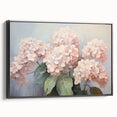 Framed canvas wall art showcasing a botanical hydrangea design in vibrant colors, featuring a sleek black frame, perfect for home decor enhancement.