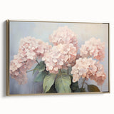 Framed botanical wall art showcasing vibrant hydrangea flowers on a canvas, featuring a gold frame for an elegant touch, ideal for home decor and floral enthusiasts.