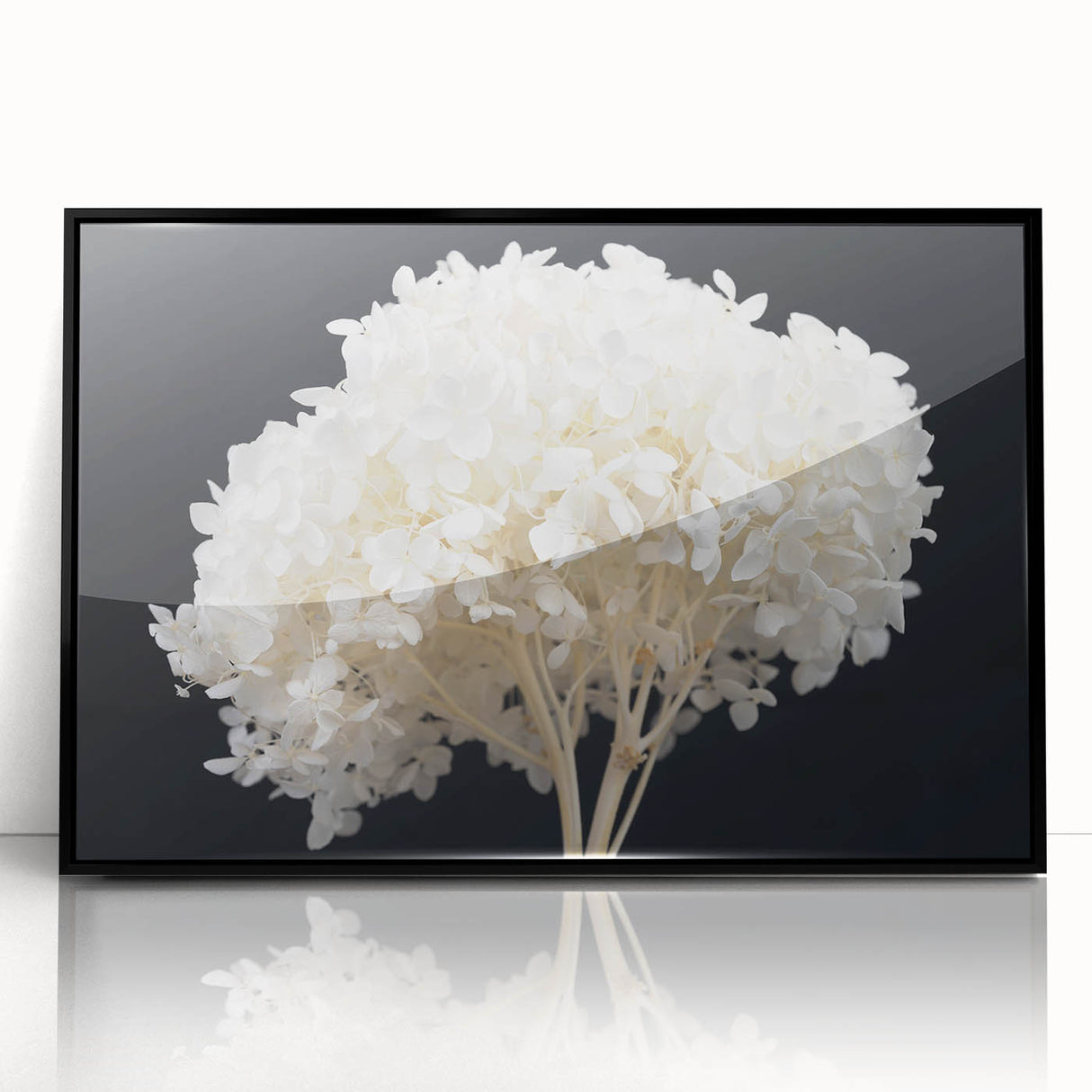 Framed wall art featuring a botanical design of vibrant blue and green hydrangeas on a black background, perfect for adding a touch of elegance to home decor.