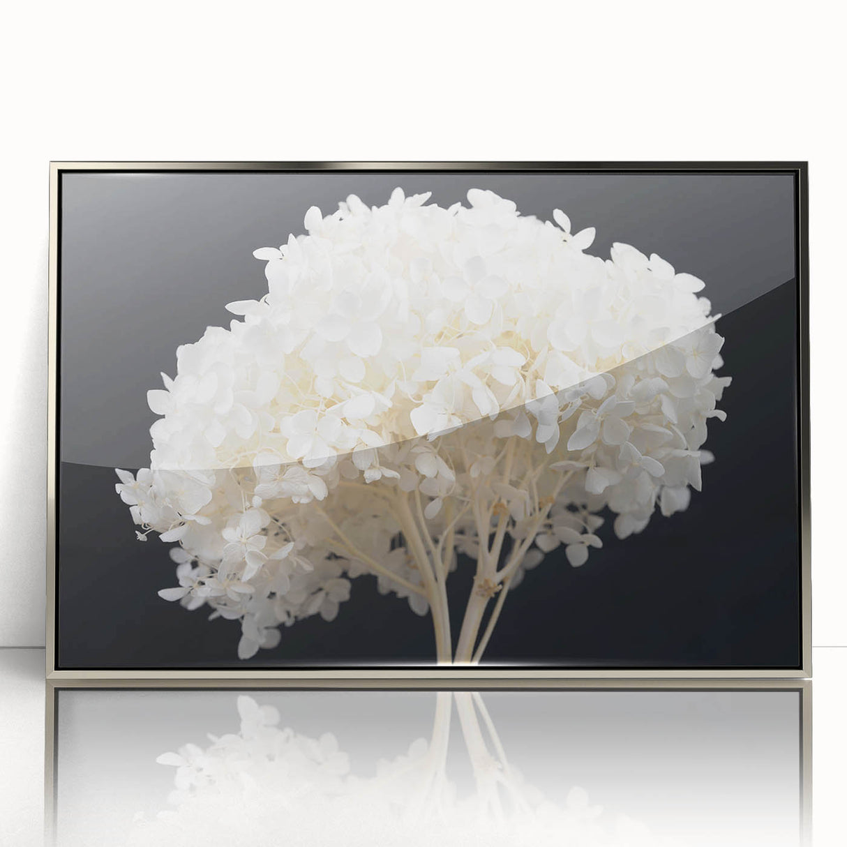 Framed botanical wall art featuring a vibrant blue hydrangea design with silver accents, elegantly showcased against a neutral background, perfect for home decor.
