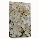 Hydrangea wall art collection featuring vibrant blue and pink acrylic designs, elegantly displayed in a side view showcasing mounting pins and an artistic finish.