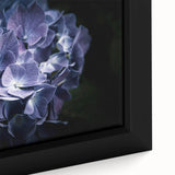 Close-up of a framed botanical wall art piece showcasing vibrant hydrangea flowers in rich hues of blue and purple, perfect for enhancing home decor with nature-inspired elegance. Ideal for floral enthusiasts and art collectors.