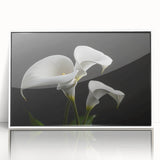 Framed botanical wall art showcasing a vibrant iris design in a white frame, perfect for enhancing home decor with floral elegance and color.