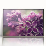 Framed wall art featuring a botanical lavender design with silver accents, showcasing delicate flowers against a soft background, perfect for home decor.