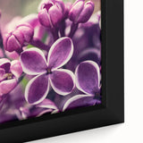 Close-up of a framed lavender botanical wall art piece showcasing delicate purple flowers on a textured canvas, perfect for enhancing home decor with a natural touch.