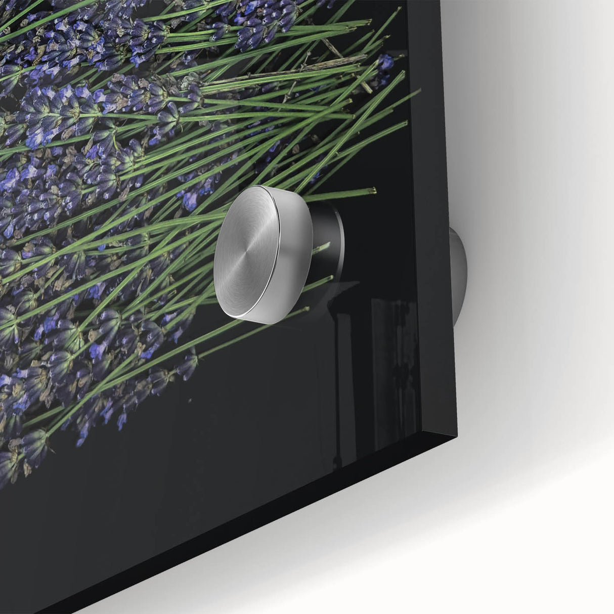 Close-up of a botanical wall art piece featuring delicate lavender flowers on a vibrant green background, displayed behind acrylic glass for a polished look. Perfect for adding a touch of nature-inspired elegance to home decor.