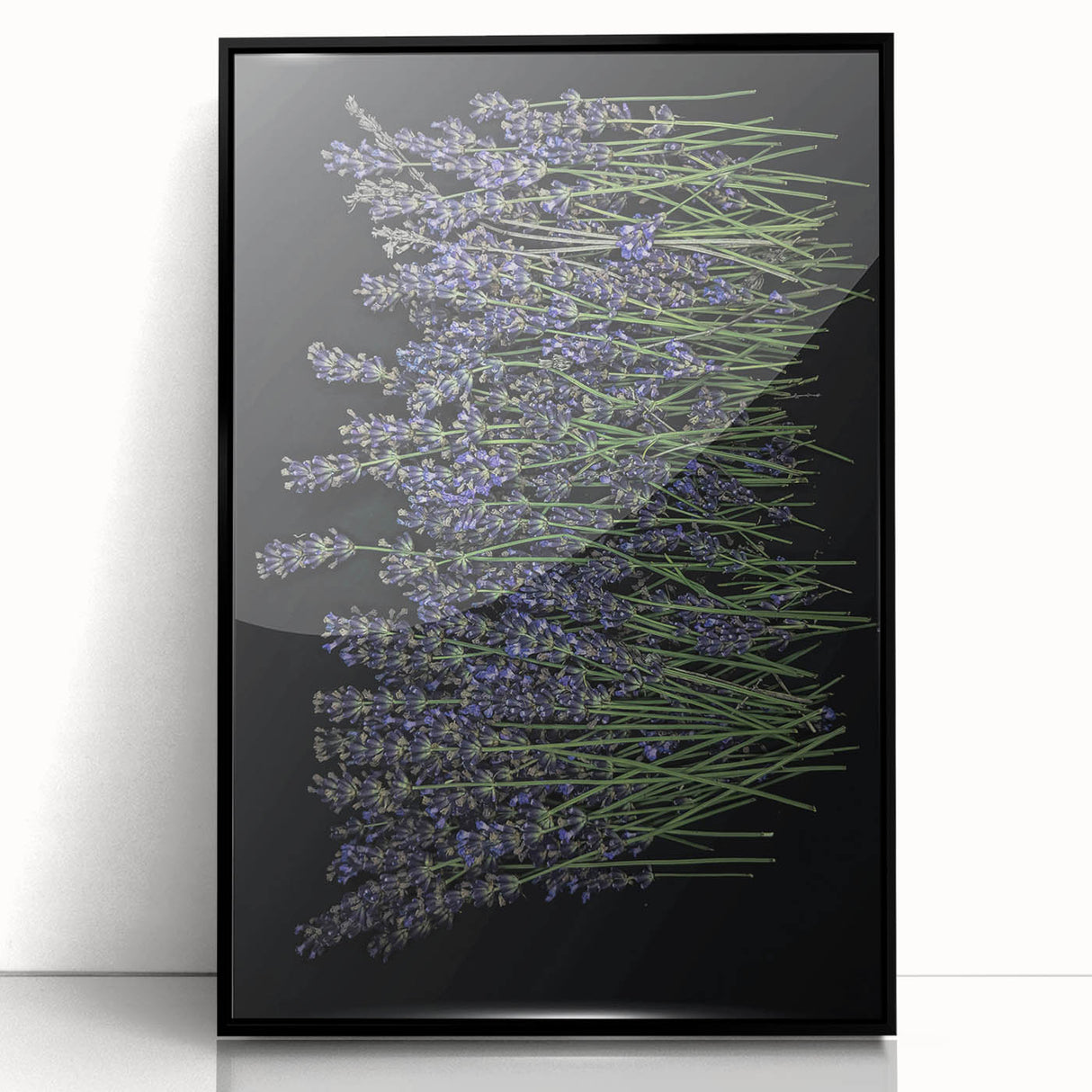 Framed acrylic wall art featuring a botanical lavender design, showcasing intricate floral details in shades of purple against a sleek black frame, perfect for home decor.