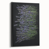 Framed canvas wall art featuring a botanical lavender design, showcasing vibrant purple flowers against a sleek black frame, perfect for home decor.