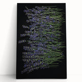 Botanical wall art featuring a serene lavender design on stretched canvas, elegantly leaning against a light-colored wall, enhancing home decor with a calming touch.