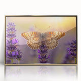 Framed botanical wall art featuring delicate lavender flowers in shades of purple and green, accented with a gold frame for an elegant touch, ideal for home decor.