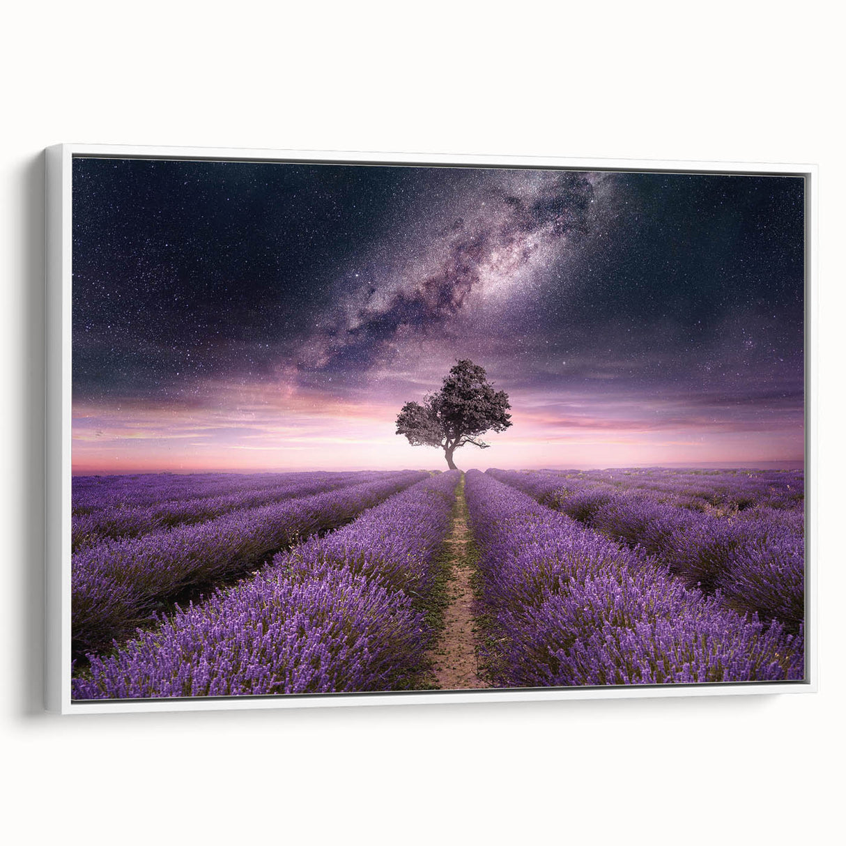 Framed canvas wall art showcasing a botanical lavender design, featuring delicate purple flowers and green leaves, presented in a stylish white frame with a side view perspective. Perfect for adding a touch of nature-inspired elegance to home decor.