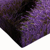 Close-up of a vibrant botanical wall art piece showcasing delicate lavender flowers on stretched canvas, perfect for home decor and nature-themed interiors.